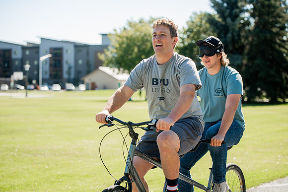 A BYUI therapeutic recreation class rides adaptive bicycles in Porter park during the fall 2021 semester.