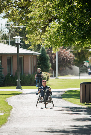 A BYUI therapeutic recreation class rides adaptive bicycles in Porter park during the fall 2021 semester.
