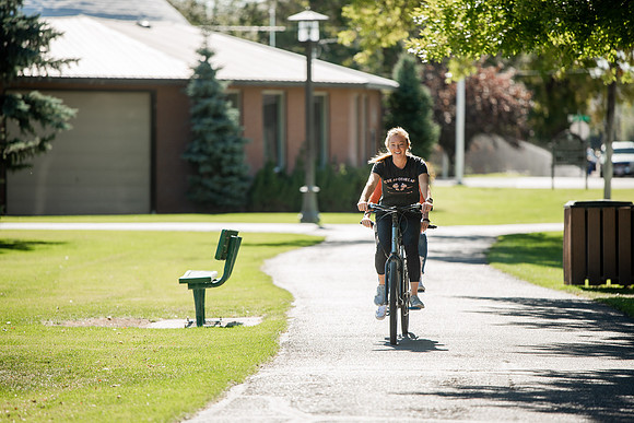 A BYUI therapeutic recreation class rides adaptive bicycles in Porter park during the fall 2021 semester.