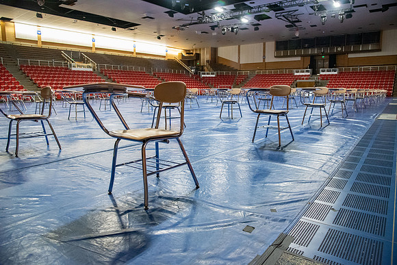 Desks in the Hart gymnasium set 6ft apart to practice physical distancing in efforts to fight the COVID-19 virus.