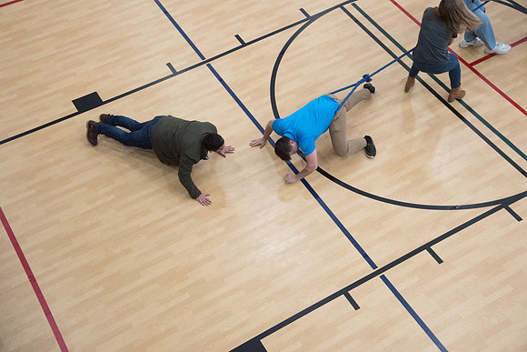 Members of Student Support play Tug-A-War on the I-Center Courts. January 2019