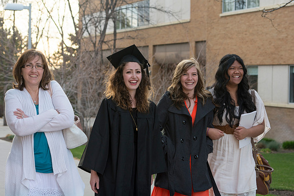 Brigham Young University-Idaho Graduates tour campus with their families saying goobyes to peers and getting pictures with friends and family before the convocation ceremonies. Photo by Ryan Chase