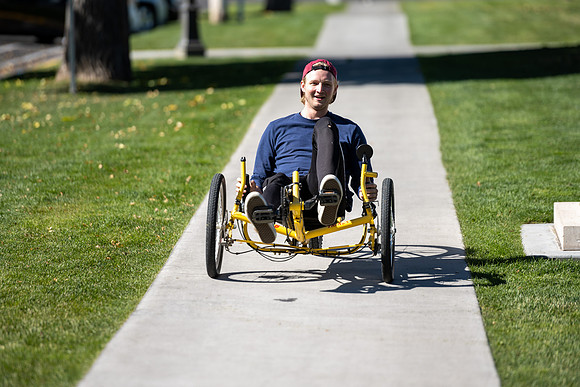 Students in Keith Barney's Adaptive Recreation class get the opportunity to ride hand pedal tricycles at Porter Park.