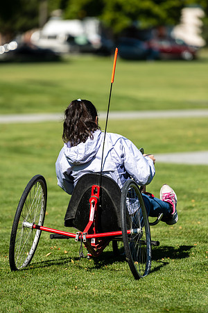 Students in Keith Barney's Adaptive Recreation class get the opportunity to ride hand pedal tricycles at Porter Park.