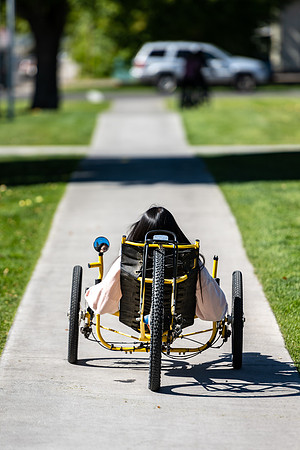 Students in Keith Barney's Adaptive Recreation class get the opportunity to ride hand pedal tricycles at Porter Park.