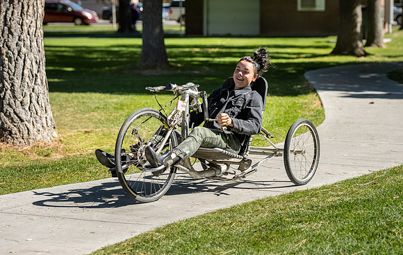 Students in Keith Barney's Adaptive Recreation class get the opportunity to ride hand pedal tricycles at Porter Park.