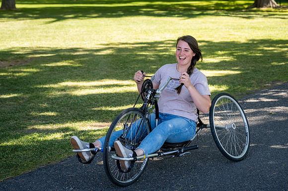 Students in Keith Barney's Adaptive Recreation class get the opportunity to ride hand pedal tricycles at Porter Park.