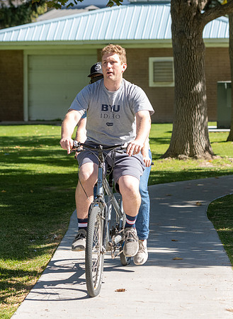 Students in Keith Barney's Adaptive Recreation class get the opportunity to ride hand pedal tricycles at Porter Park.