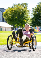 Students in Keith Barney's Adaptive Recreation class get the opportunity to ride hand pedal tricycles at Porter Park.