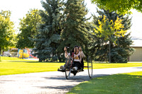 Students in Keith Barney's Adaptive Recreation class get the opportunity to ride hand pedal tricycles at Porter Park.