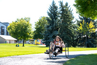 Students in Keith Barney's Adaptive Recreation class get the opportunity to ride hand pedal tricycles at Porter Park.