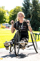 Students in Keith Barney's Adaptive Recreation class get the opportunity to ride hand pedal tricycles at Porter Park.