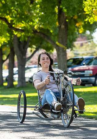 Students in Keith Barney's Adaptive Recreation class get the opportunity to ride hand pedal tricycles at Porter Park.