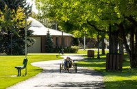 Students in Keith Barney's Adaptive Recreation class get the opportunity to ride hand pedal tricycles at Porter Park.