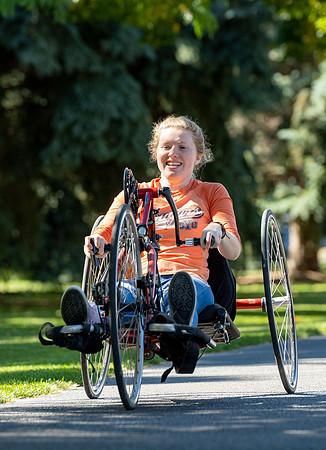 Students in Keith Barney's Adaptive Recreation class get the opportunity to ride hand pedal tricycles at Porter Park.
