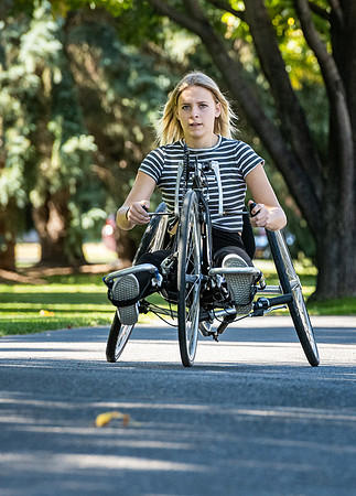 Students in Keith Barney's Adaptive Recreation class get the opportunity to ride hand pedal tricycles at Porter Park.