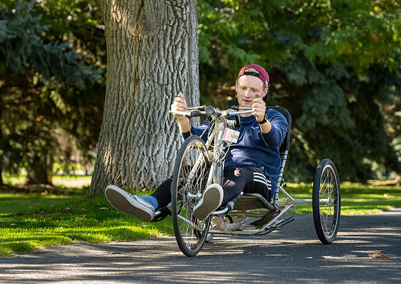 Students in Keith Barney's Adaptive Recreation class get the opportunity to ride hand pedal tricycles at Porter Park.