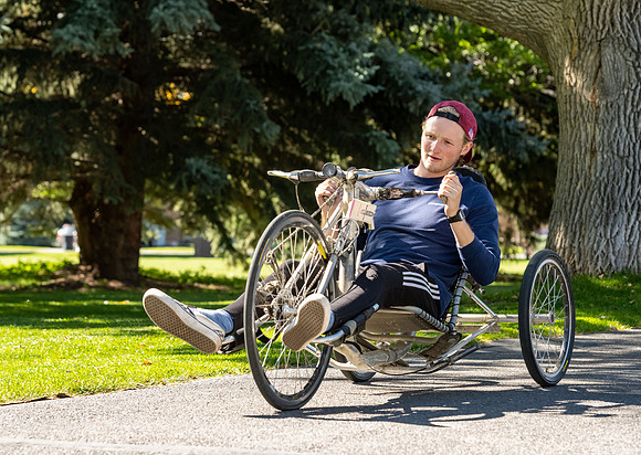 Students in Keith Barney's Adaptive Recreation class get the opportunity to ride hand pedal tricycles at Porter Park.
