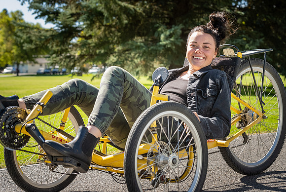 Students in Keith Barney's Adaptive Recreation class get the opportunity to ride hand pedal tricycles at Porter Park.