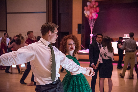 Dressed up and ready to dance, students gather with their dates and friends at the Valentine's Ball. Feb 2019