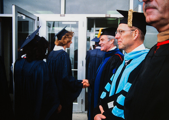 Graduates march into the Hart building during the processional. Dean Sorensen