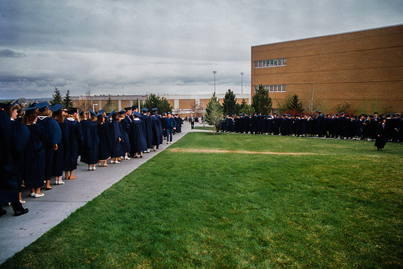 Graduates march into the Hart building during the processional.