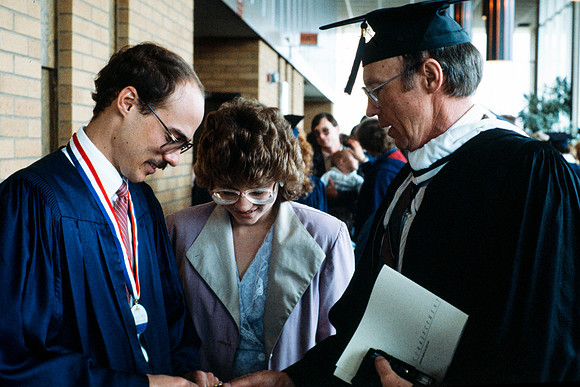 Graduate Quinn Snell, wife Kristen and his father Golden Snell