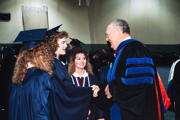 Charles "Tiny" Grant and graduates
