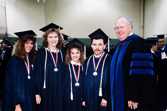 Charles "Tiny" Grant and graduates
