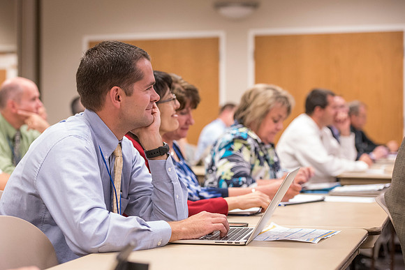 Faculty members come together in preparation of the new school year.