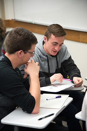 Group problem-solving in Brother Kelson's biology class.