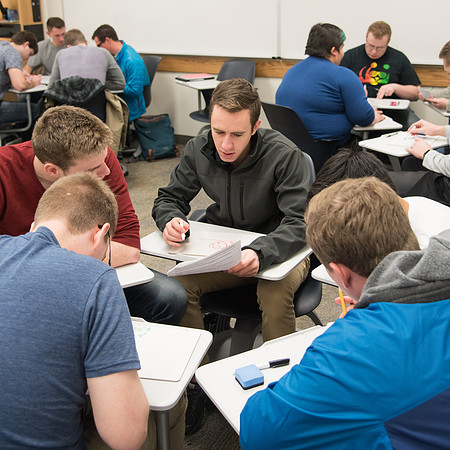 Group problem-solving in Brother Kelson's biology class.