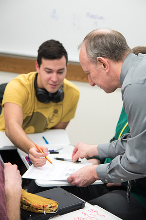 Group problem-solving in Brother Kelson's biology class.