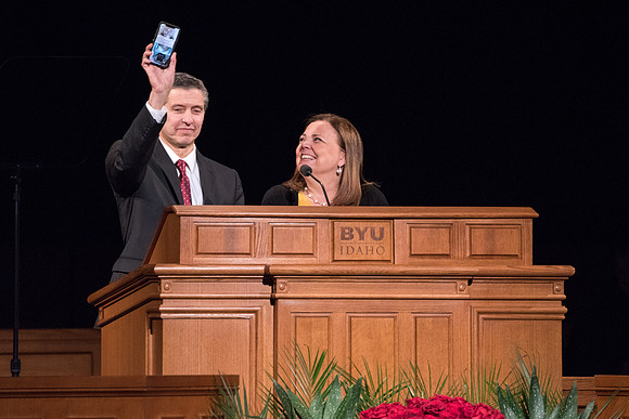 Elder Joaquin E. Costa and Sister Renee Costa speaks at the devotional.