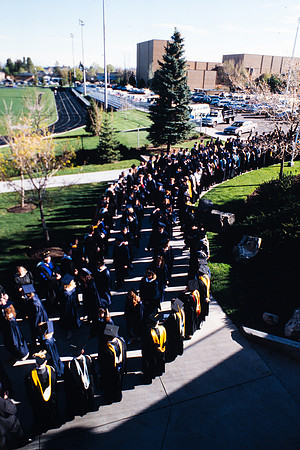 Graduates march into the Hart building during the processional.