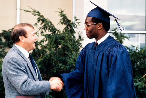 Bishop Robert Franz Rick's college 9th ward and Charles Wills Elect English graduate from Nigeria