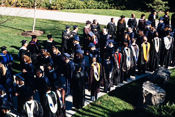 Rick's College graduates marching to the Hart during the processional