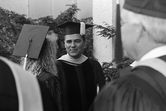President Bennion greeting graduates