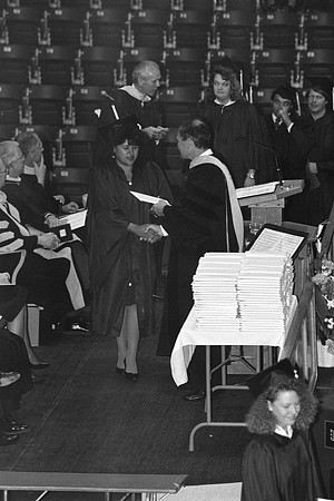 President Bennion handing diplomas