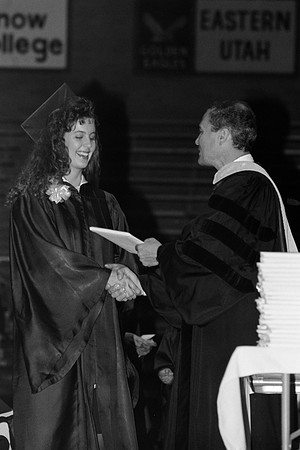 President Bennion handing diplomas