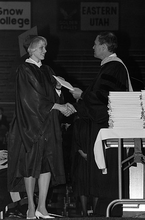President Bennion handing diplomas