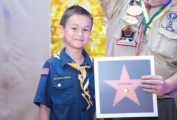 Cub Scouts from Pack 306, along with their families, came for a night of awards at the church.