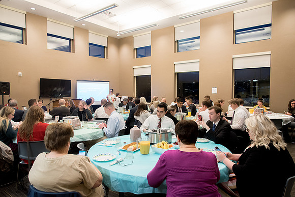 Housing & Student Living employees and university faculty members gather for an every morning "Morningside."