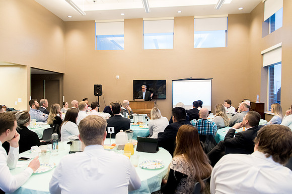 Housing & Student Living employees and university faculty members gather for an every morning "Morningside."
