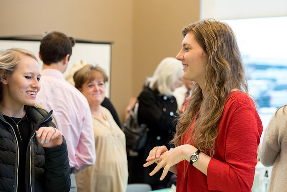 Housing & Student Living employees and university faculty members gather for an every morning "Morningside."