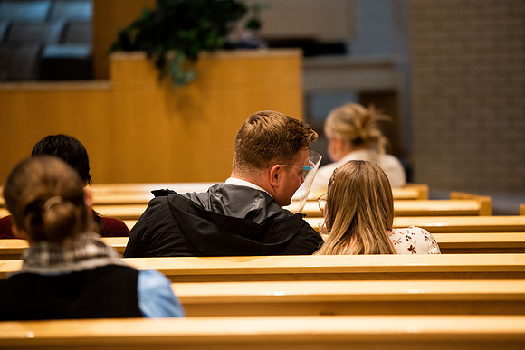 BYUI students watch sister Susan Orme's devotional in the Taylor chapel during spirit week.