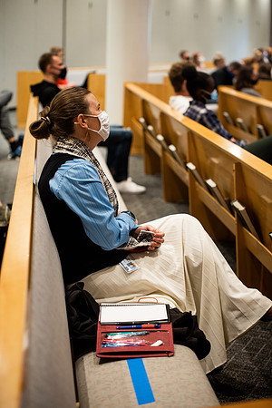BYUI students watch sister Susan Orme's devotional in the Taylor chapel during spirit week.