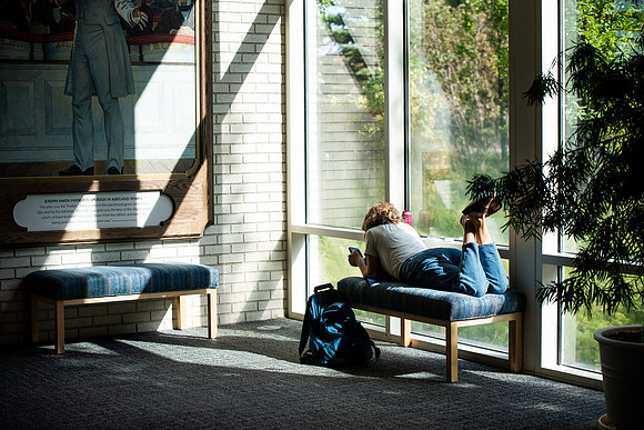 BYUI students watch sister Susan Orme's devotional in the Taylor chapel during spirit week.