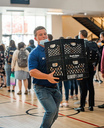 BYUI students and faculty gather by the I-Center after devotional and eat Reed's dairy ice cream to celebrate spirit week.