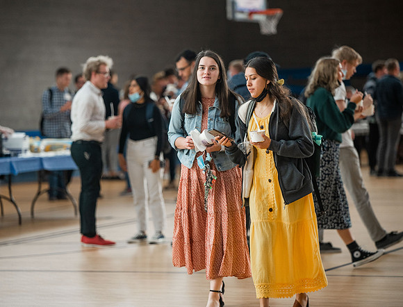BYUI students and faculty gather by the I-Center after devotional and eat Reed's dairy ice cream to celebrate spirit week.